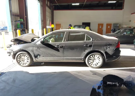 2012 Ford Fusion Hybrid из США, поврежденный, VIN 3FADP0L31CR447367